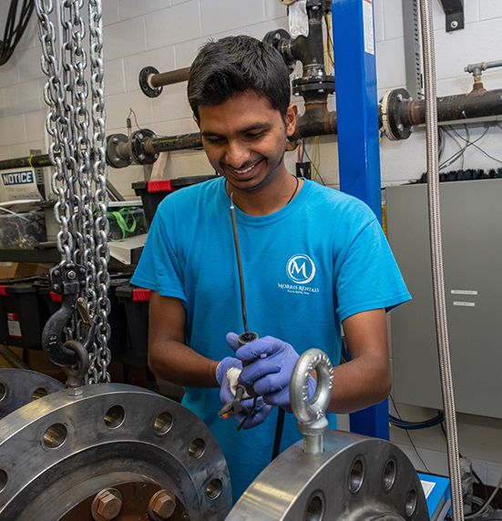 man working on big machine